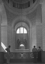 Three People in Shadow on Rotunda Balcony, State Capitol Building, Lincoln, Nebraska, USA, by Samuel H. Gottscho, June 1934