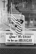 American Flag in Store Window, "Gee, It's Great to be an American", Covington, Kentucky, USA, John Vachon for Farm Security Administration, September 1939