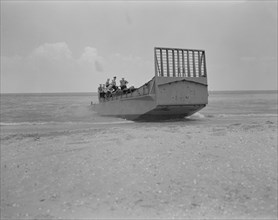 Crew Being Trained on Ramp Boat, which is Capable of Landing Tanks and Large Forces of Men at Beach Positions, New Orleans, Louisiana, USA, Howard R. Hollem for Office of War Information, July 1942