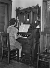 Farm Girl Playing Organ, McIntosh County, North Dakota, USA, John Vachon for Farm Security Administration, November 1940