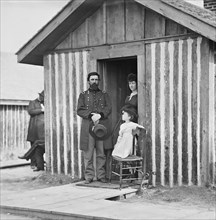 Union Army Brigadier General John A. Rawlins, Chief of Staff, with Wife and Child at Door of Their Quarters, City Point, Virginia, 1860's