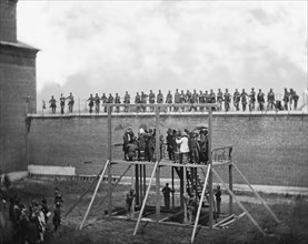 Adjusting Ropes on Scaffold of Conspirators of Assassination of U.S. President, Abraham Lincoln, Arsenal Prison, Washington, DC, USA, by Alexander Gardner, July 7, 1865
