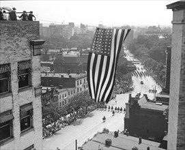 American Flag Hanging Above Parade, Washington DC, USA, National Photo Company, 1923