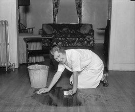 Young Woman Scrubbing Floor, College Home Economics Class, Washington DC, USA, National Photo Company, December 1926
