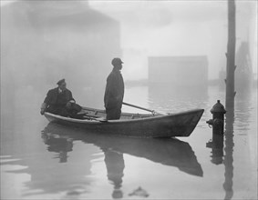 Two Men in Boat after Potomac River Flood, Georgetown, Washington DC, USA, National Photo Company, February 1918