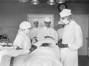 Surgery Being Performed on Patient, National Photo Company, 1922