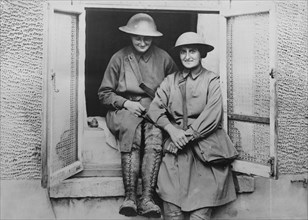 Elsie Knocker and Mairi Chisholm, Women's Emergency Corps, Portrait wearing their Ambulance Driver Uniforms and Helmets during World War I, West Flanders, Belgium, Bain News Service, July 1917