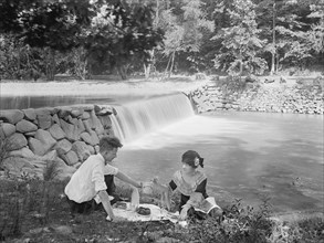 Couple Having Picnic Lunch by Waterfall at Rock Creek Park, Washington DC, USA, National Photo Company, 1924