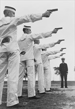 Instruction in Pistol Shooting, U.S. Naval Academy, Annapolis, Maryland, USA, by Lieutenant Whitman for Office of War Information, July 1942