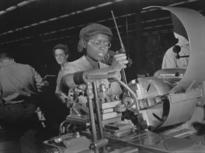 Female Lathe Operator at Aircraft Manufacturing Plant, Milwaukee, Wisconsin, USA, Ann Rosener for Office of War Information, October 1942