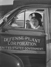 Female Driver Shuttling Workers between Two War Plants, Milwaukee, Wisconsin, USA, Ann Rosener for Office of War Information, October 1942