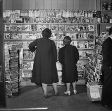Two Women Browsing in Magazine Shop, Southington, Connecticut, USA, Fenno Jacobs for Office of War Information, May 1942