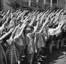 Young Schoolchildren Pledging their Allegiance to the Flag, Southington, Connecticut, USA, Fenno Jacobs for Office of War Information, May 1942