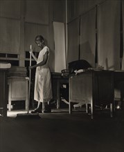 Government Charwoman Cleaning Office after Regular Working Hours, Washington DC, USA, Gordon Parks for Office of War Information, August 1942