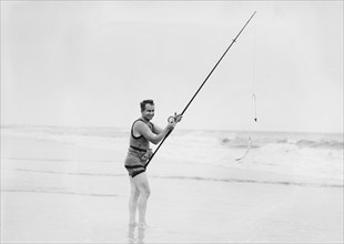 Man Surf Fishing, Long Beach, New York, USA, Bain News Service, 1914