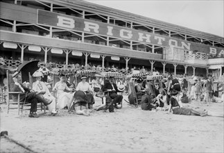 Crowd Relaxing at Beach, Brighton Beach, New York, USA, Bain News Service, 1915