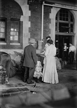 Immigrant Family Arriving at Ellis Island, New York City, New York, USA, Bain News Service, March 1917