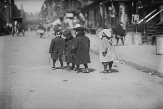 Four Children Playing in Street, New York City, New York, USA, Bain News Service, April 1909