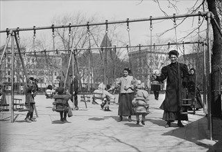 Children in Swings, Hamilton Fish Park, New York City, New York, USA, Bain News Service, 1910
