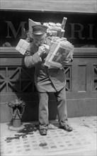 Mailman Delivering Mail and Packages, New York City, New York, USA, Bain News Service, May 1920