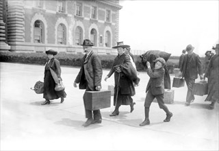 Arrival of Immigrants, Ellis Island, New York City, New York, USA, Bain News Service, 1920