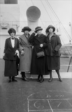 Physicist Marie Curie (2nd Right) Standing with her daughters Irene and Eve, and Mrs. William B. Maloney, on RMS OIympic, Arriving in New York City, New York, USA, to Raise Funds for Radium Research, ...