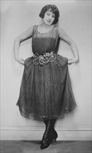 Actress Estelle Taylor, Fashion Portrait in Crepe over Gold Lace Dress, Bain News Service, 1920