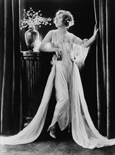 Actress Marion Davies, Fashion Portrait Wearing Dress with Flowing Fabric, Bain News Service, 1922