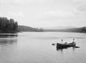 Two Men in Canoe on Lake, Adirondack Mountains, New York, USA, William Henry Jackson for Detroit Publishing Company, 1902