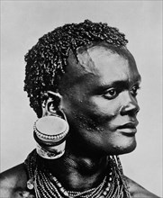 African Man with Jam Pot Hanging from Ear, Kenya, 1900