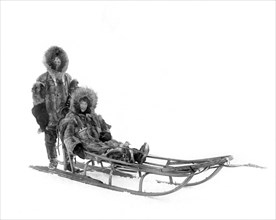 Couple on Dog Sled, Nome, Alaska, 1900