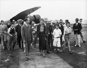 Amelia Earhart with Group of People near Airplane, Harris & Ewing, 1932