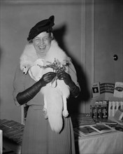 First Lady Eleanor Roosevelt being Presented with Orchid on her 55th Birthday, Washington DC, USA, Harris & Ewing, October 11, 1939
