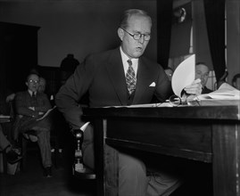 Joseph P. Kennedy, Chairman of U.S. Maritime Commission, as Appearing before Congressional Committee, Washington DC, USA, Harris & Ewing, December 1937