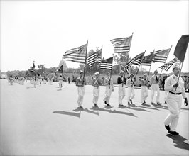 Schoolboy Patrols Marching with American Flags during Annual Safety Parade, Constitution Avenue, Washington DC, USA, Harris & Ewing, May 1938