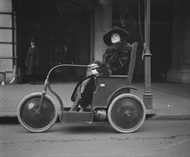 Woman in Three-Wheeled Vehicle, Washington DC, USA, Harris & Ewing, 1922