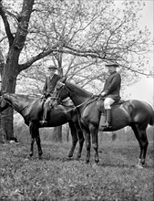 Theodore Roosevelt (right) with Unidentified Man on Horseback, Harris & Ewing, 1915
