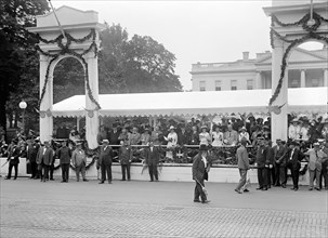 U.S. President Woodrow Wilson, First Lady Edith Bolling Wilson and others Watching Confederate Reunion Parade from Viewing Stand in front of White House, Washington DC, USA, Harris & Ewing, June 1917