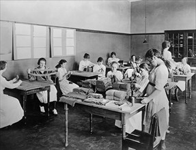 Women Sewing and Knitting in Work Room, American Red Cross Garment Division, Washington DC, USA, Harris & Ewing, 1917