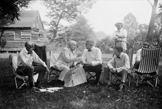 Henry Ford, Thomas Edison, U.S. President Warren Harding and Harvey Firestone, Portrait while Sitting at Campsite, Maryland, USA, Harris & Ewing, 1921
