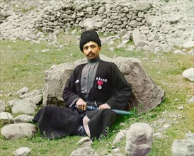 Portrait of Sunni Muslim Man Wearing Traditional Dress and Headgear with Sheathed Dagger at Side, Dagestan, Russia, Prokudin-Gorskii Collection, 1910