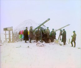 Group of People Using Two Telescopes to View Solar Eclipse on Snow-Covered Mountain, near Cherniaevo Station, Tian-Shan Mountains above Saliuktin Mines, Golodnaia Steppe, Kazakhstan, Russian Empire, P...