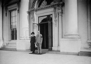 U.S. President Calvin Coolidge and First Lady Grace Coolidge, Portrait at Entrance of White House during Mourning Period for President Warren Harding, Washington DC, USA, Harris & Ewing, August 1923