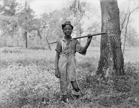 Portrait of Young Boy with Rake, Detroit Publishing Company, early 1900's