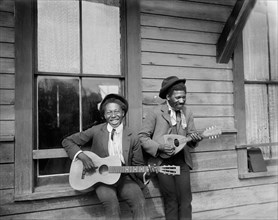 Two Men Playing Guitar and Mandolin, "True Lovers of the Muse", William Henry Jackson for Detroit Publishing Company, 1902