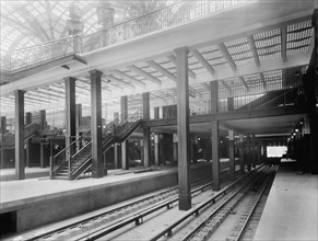 Track Level Showing Stairway and Elevators, Pennsylvania Station, New York City, New York, USA, Detroit Publishing Company, 1910