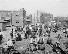 Workers Eating Dinner on the Docks, Jacksonville, Florida, USA, Detroit Publishing Company, early 1910's