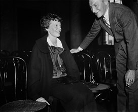 Amelia Earhart (left) Seated Portrait during Senate Hearings on Aviation Safety, Washington DC, USA, Harris & Ewing, 1936