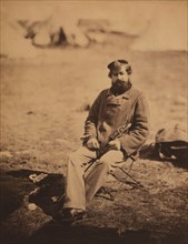 Benjamin William Marlow, British Military Doctor, Full-Length Portrait, Seated, Holding Sword, Crimean War, Crimea, Ukraine, by Roger Fenton, 1855