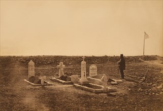 Man Standing at Cemetery Grave of British Brigadier General Thomas Leigh Goldie who was Killed in action at the Battle of Inkerman, Cathcart Hill, Crimean War, Crimea, Ukraine, by Roger Fenton, 1855